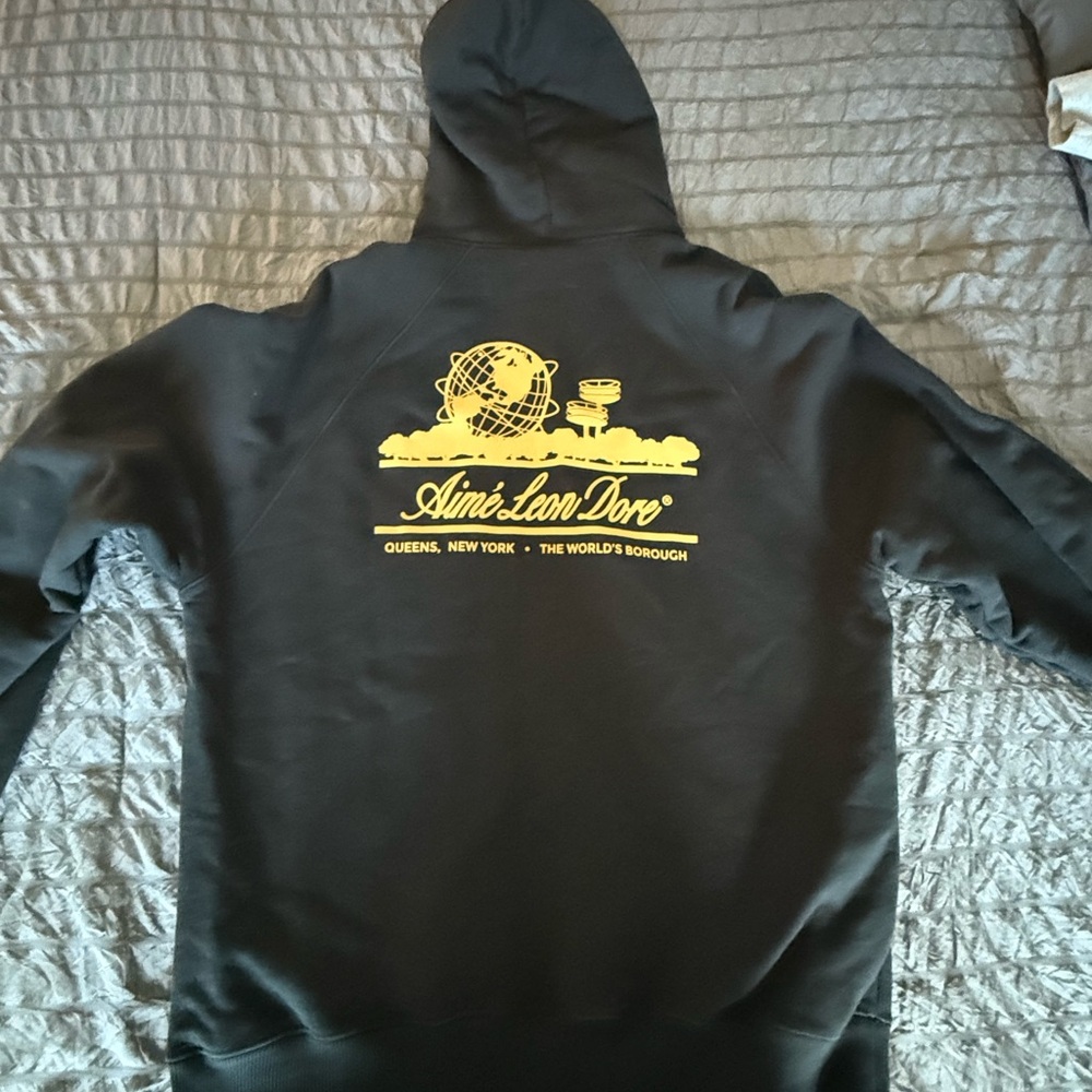 Aime Leon Dore Black Hoodie with Yellow Graphic